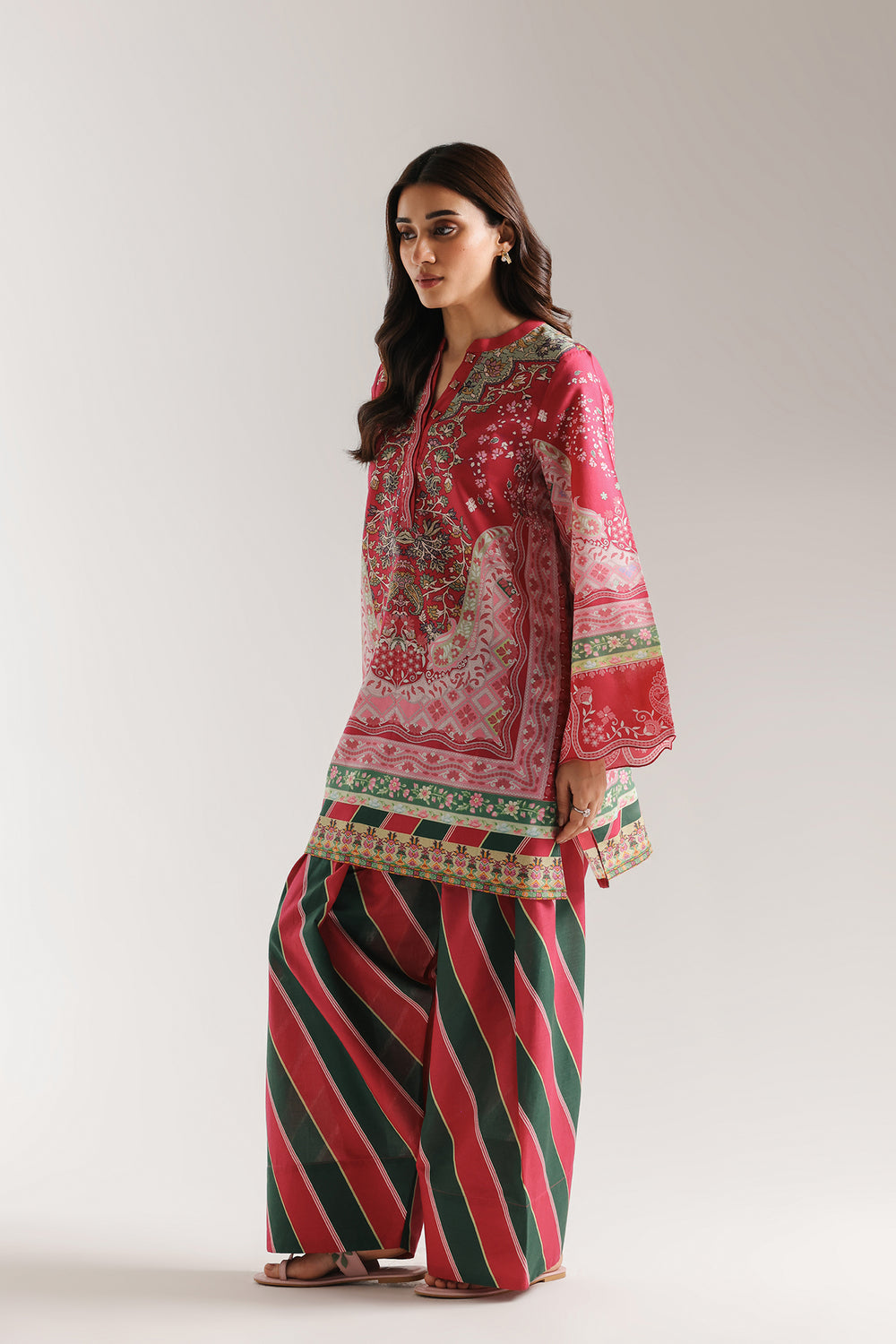red linen kurta with striped farshi pants