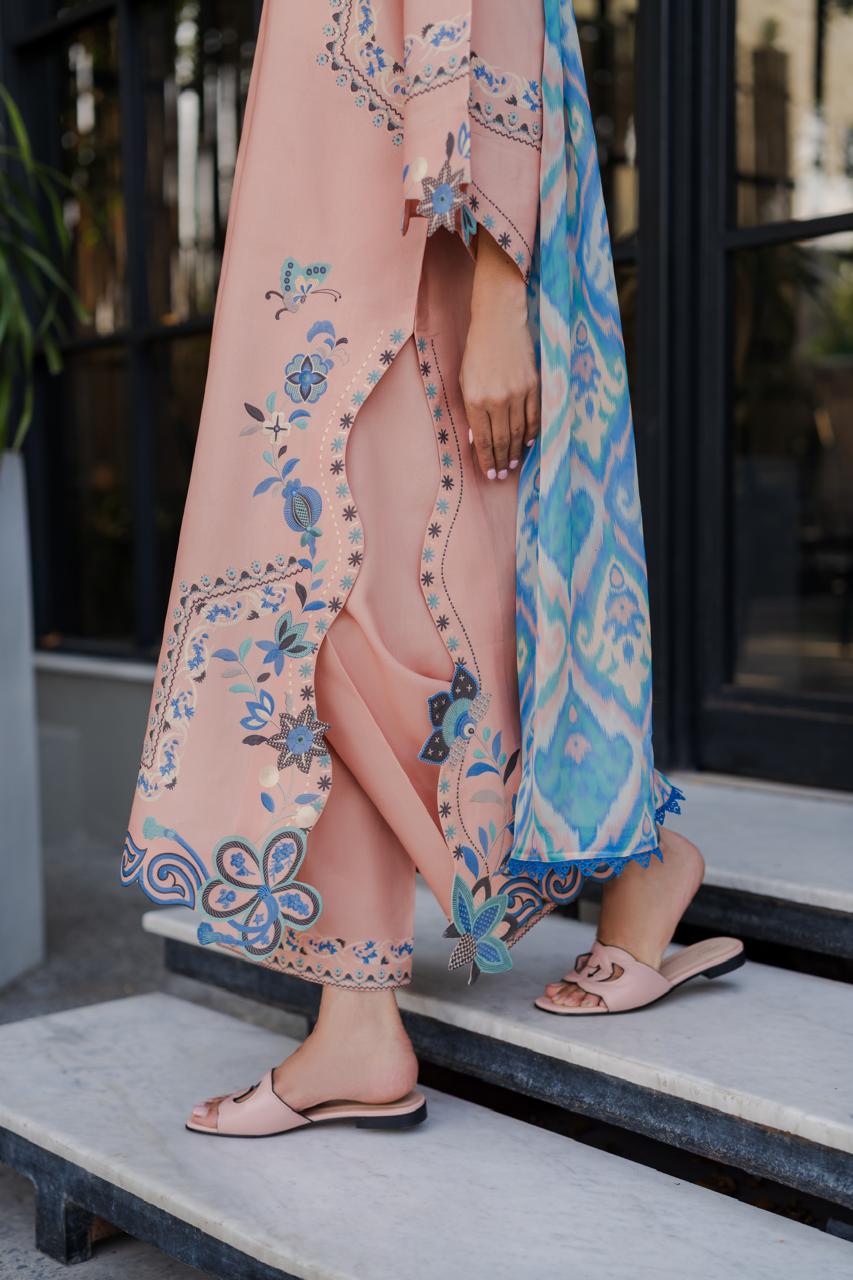 Peach modest outfit with three-quarter sleeves and printed borders