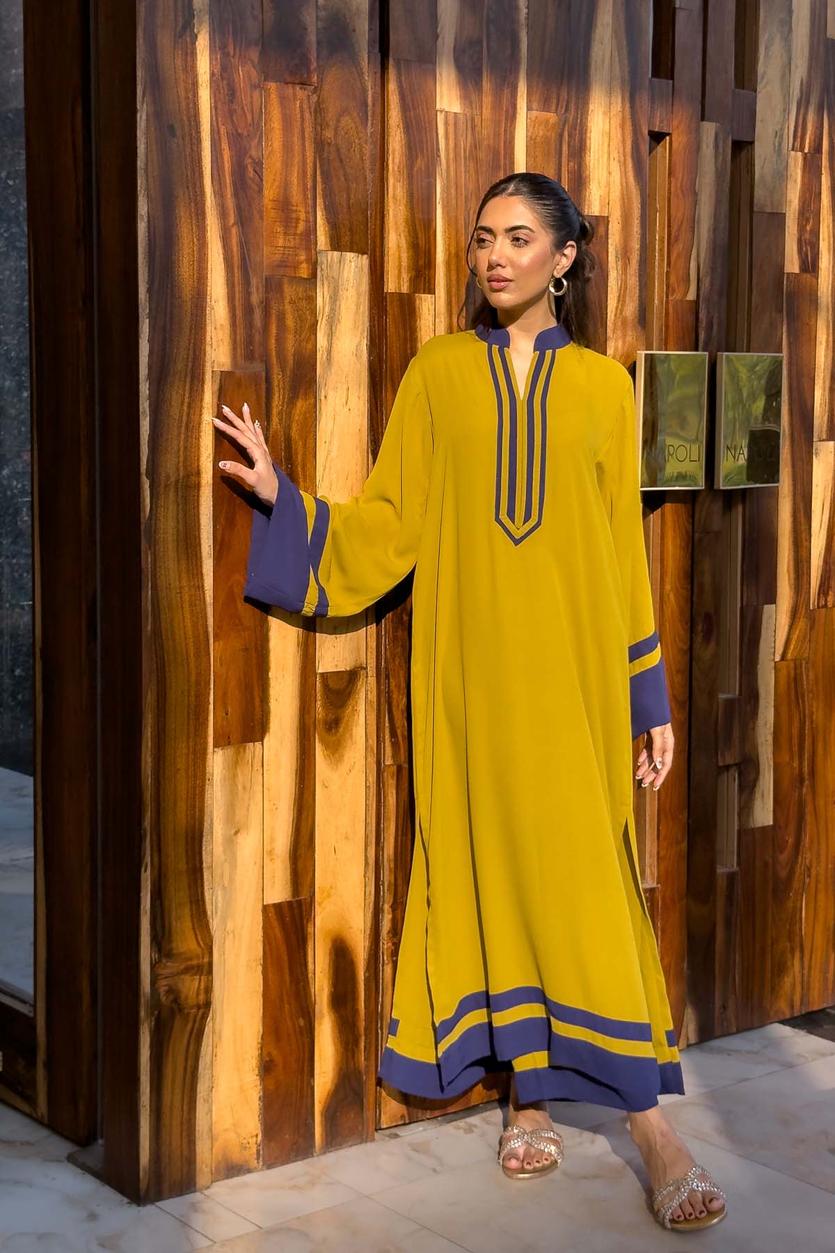 mustard modest co ord set with blue detailing