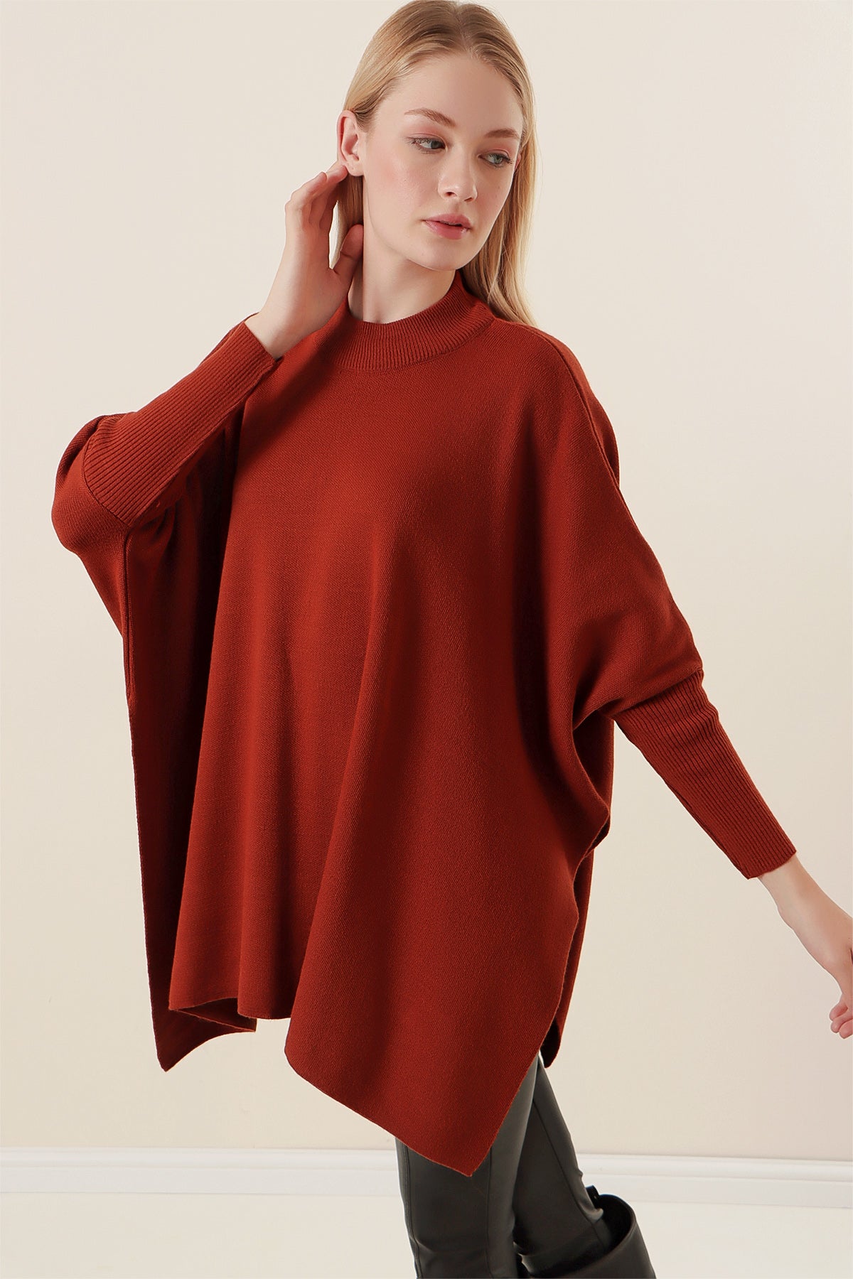 modest poncho-style sweater rust brown