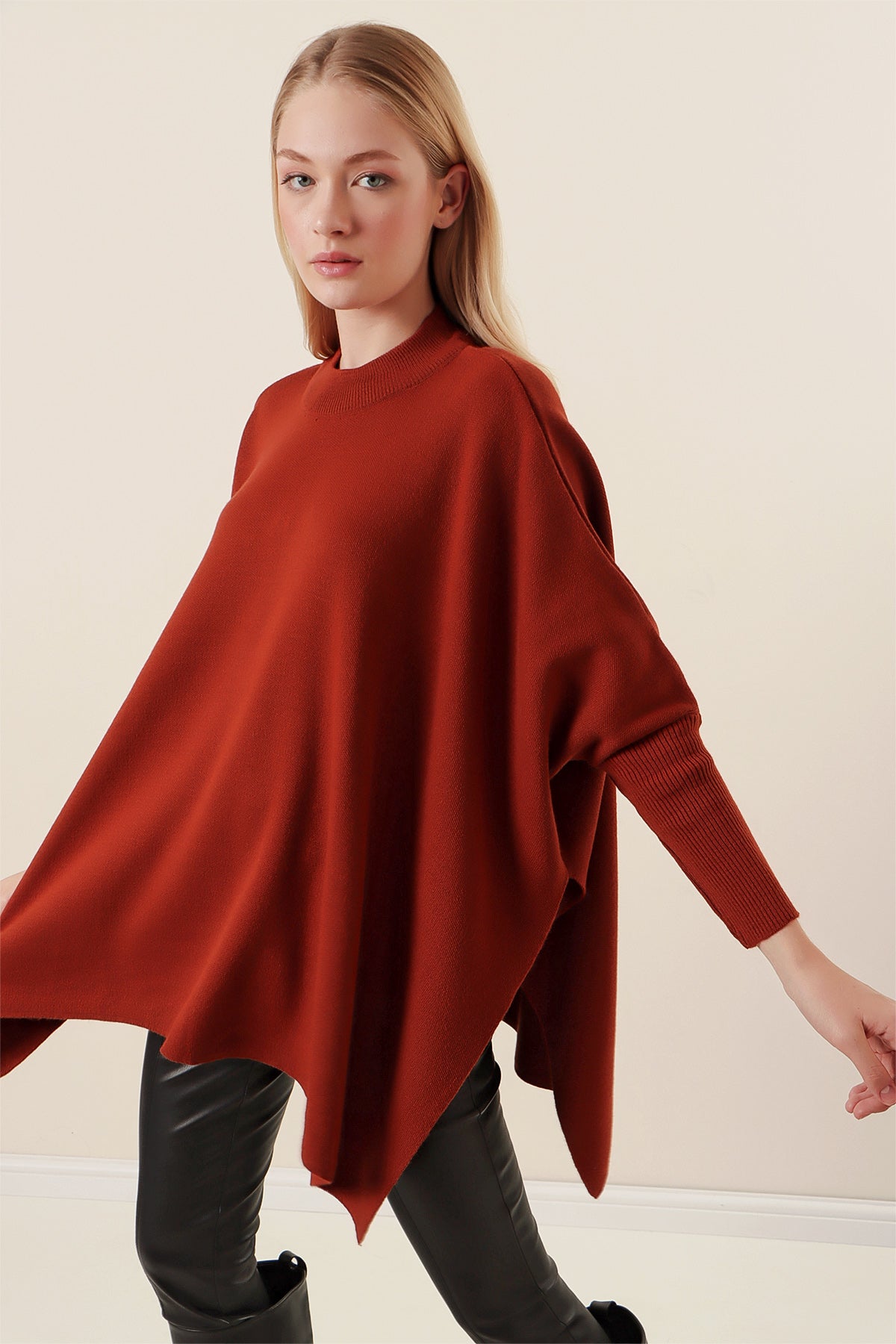 asymmetrical hem knit poncho rust