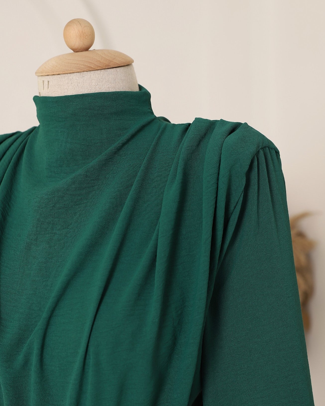 emerald modest jumpsuit with wrap skirt detail
