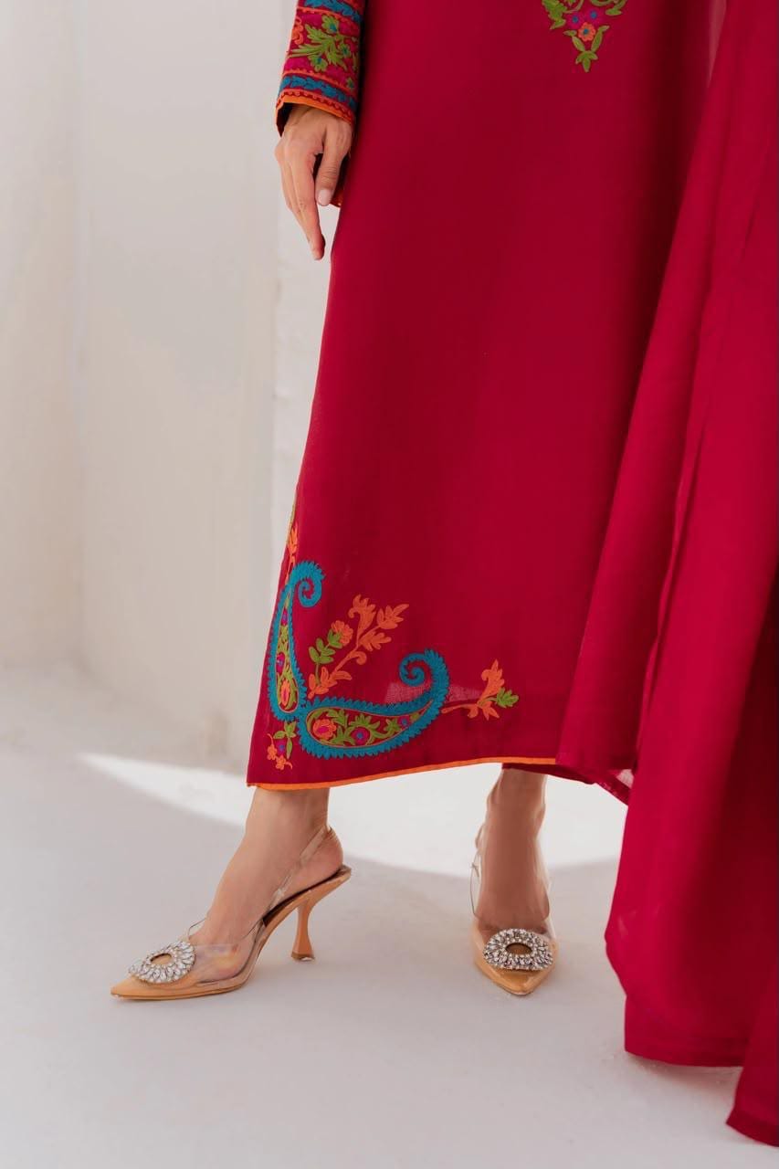 Ruby Arabesque long straight-cut kurta featuring full-length wide sleeves and decorative borders.