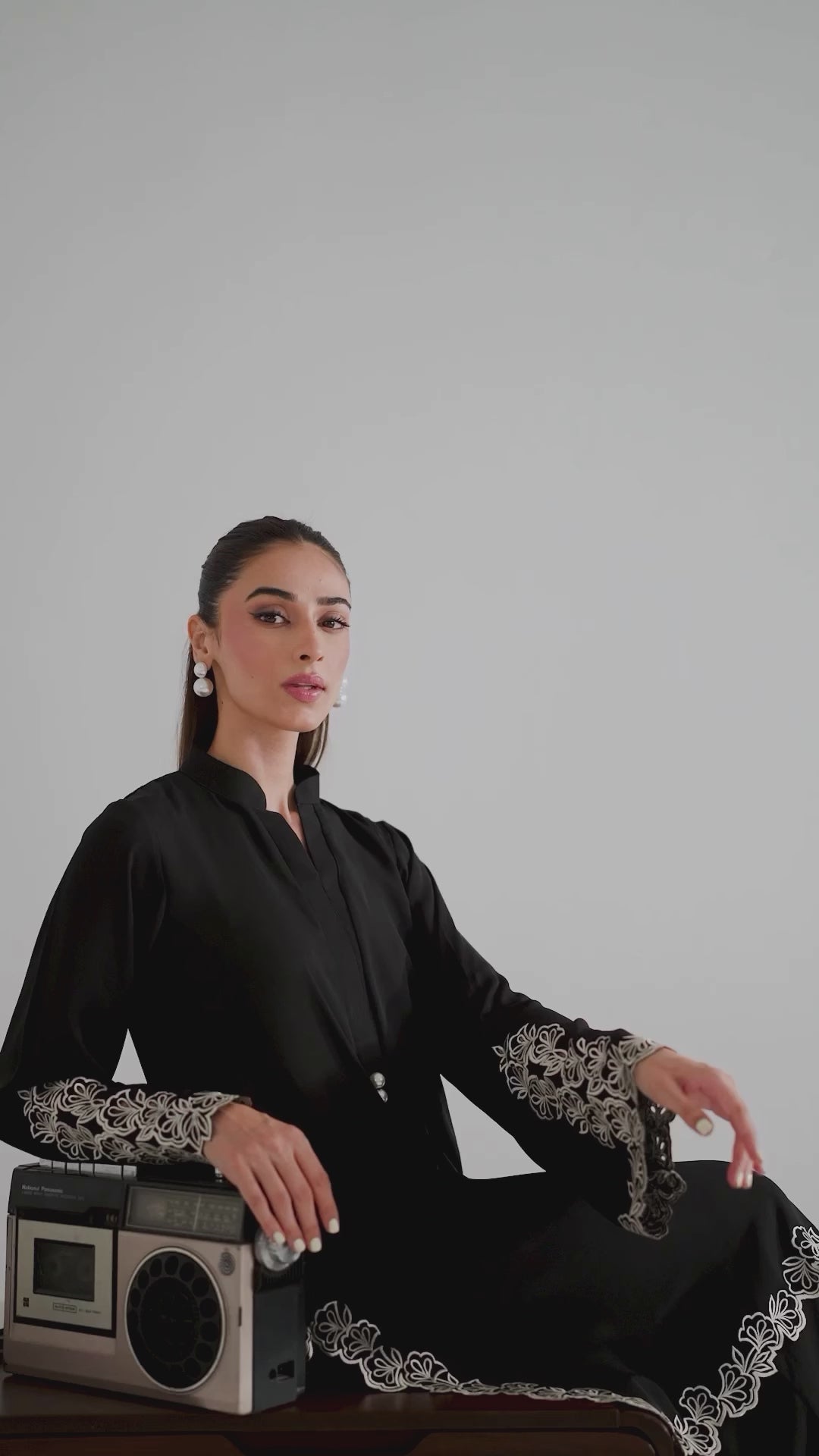 elegant black modest outfit with embroidery